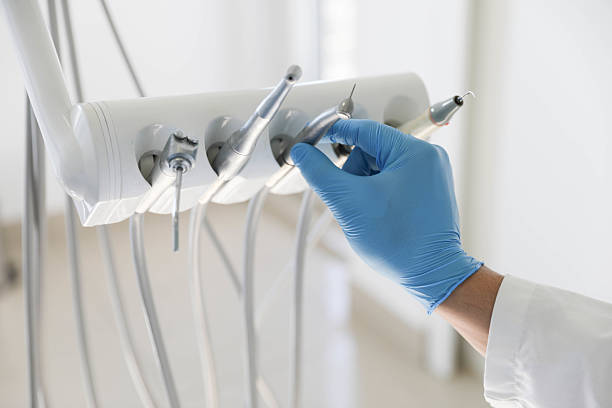 Professional Tooth Extraction technician working in Olivet, NJ